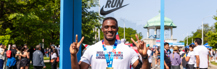 Participant posing at the Race Day Festival after the 2025 Bank of America Chicago 13.1