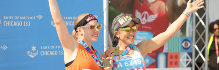 2025 Bank of America Chicago 13.1 finishers posing with their medals